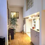 Loft With View On A Quiet Garden, Parisian Charm